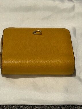 Coach Mustard Leather Compact Wallet with Gold 'C' Accent